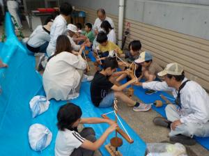 令和7年春まつりの様子（火おこし）（写真）